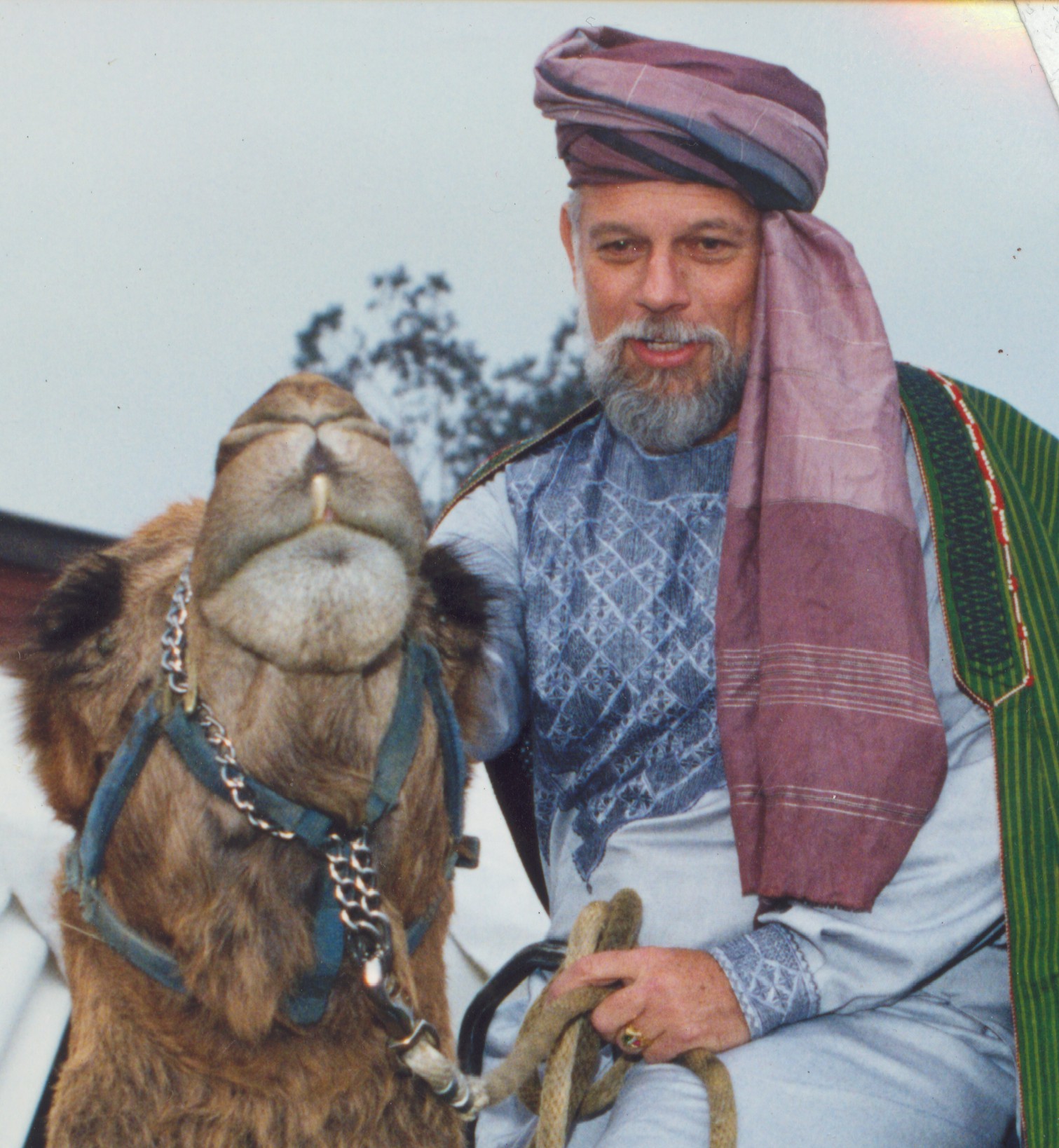 Rochester, Minnesota – Gary Bowersox rides a camel to promote a gem show.